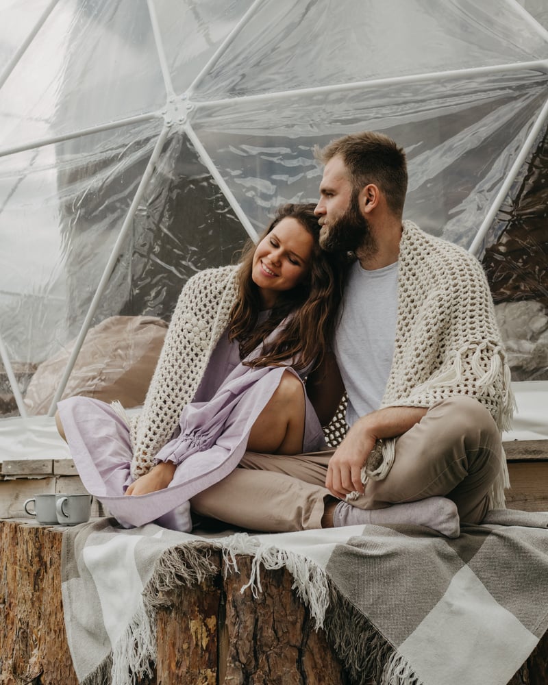 Happy couple chilling in modern nature resort